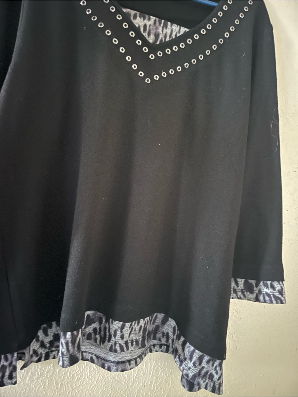 Black V-Neck Eyelet Trim Blouse with Patterned Hem
